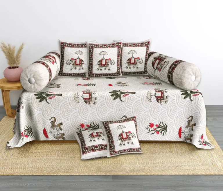 Elephant-print deewan bedding with coordinated bolster and cushion covers