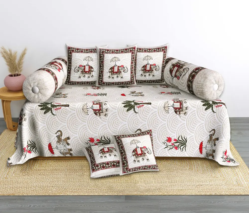 Elephant-print deewan bedding with coordinated bolster and cushion covers