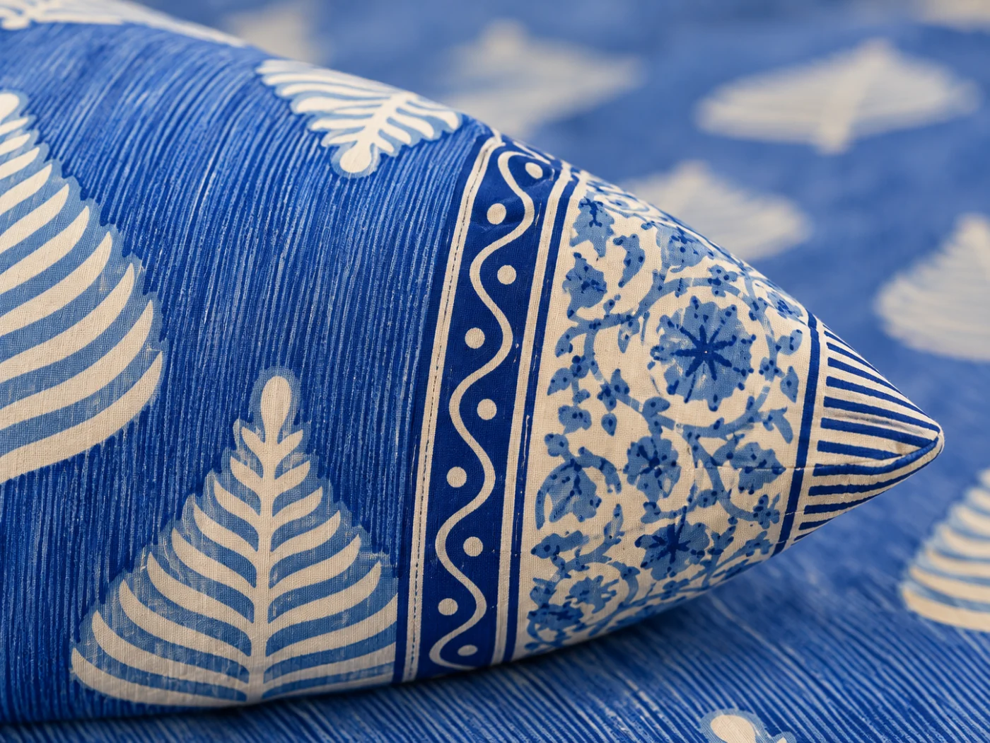 Matching Hasthakala pillow covers with chain closure detail
