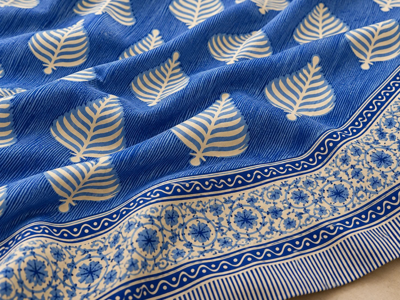 Breathable cotton texture of the blue and cream Hasthakala bedsheet